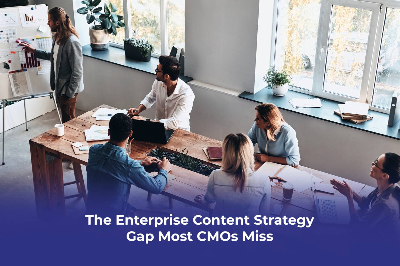 A company CMO reviewing enterprise content strategy frameworks showing brand strategy, editorial planning, content governance, and content marketing performance at enterprise scale